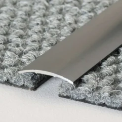 Übergangsprofil für textile Bodenbeläge / Laminat und Multilayer