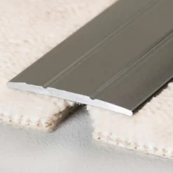 Übergangsprofil für textile Bodenbeläge und Laminat / Multilayer